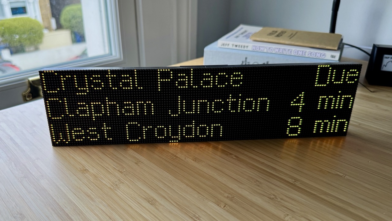 LED matrix displaying public transit arrivals